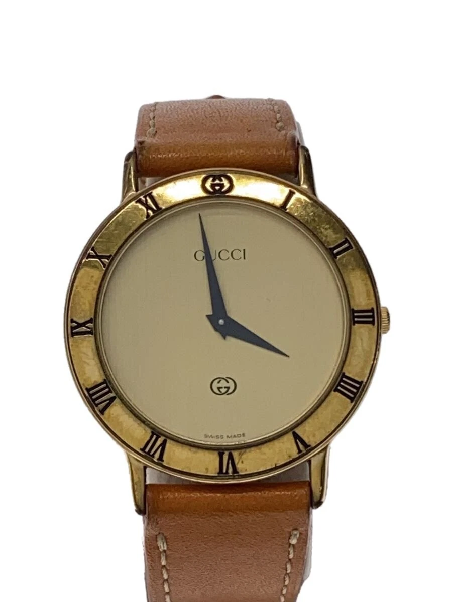 Montre Gucci/or/brw/3000M/doublure ceinture état considéré/ceinture outre mer