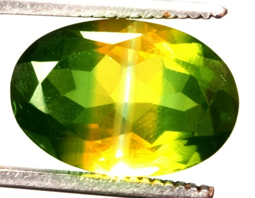 15,20 Cts. Piedra preciosa natural brasileña bicolor forma ovalada certificada - Imagen 2 de 4