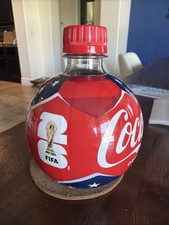 Coca-Cola FIFA 2026 World Cup Soccer Ball Shaped Unopened Full Plastic Bottle