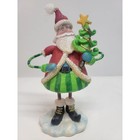 Whimsical Santa Claus Figurine Holding Christmas Tree Festive Holiday Decor