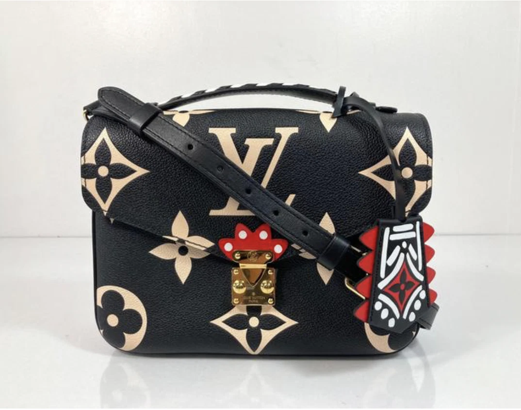 Louis Vuitton Limited Edition Crafty Monogram Pochette Metis in Black  Crossbody