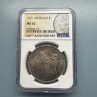 1921  US Morgan Silver Dollar $1 NGC MS62  100th Anniv Label