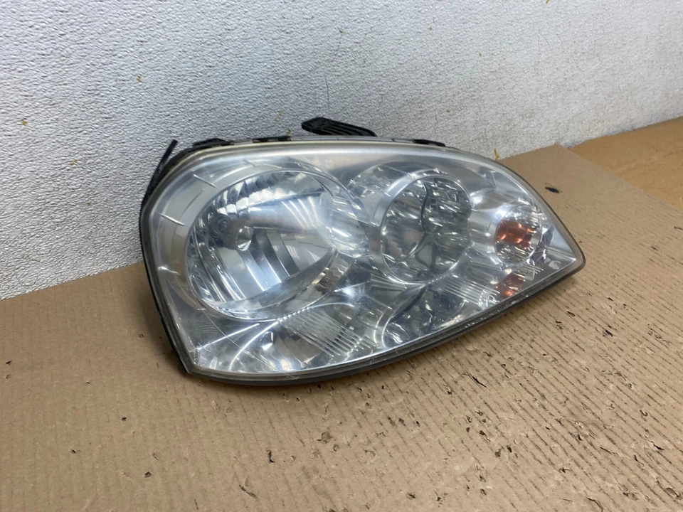 Faro halógeno derecho pasajero Suzuki Forenza 2004 a 2008 M9250 DG fabricante original Foto 3 de 4