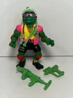 Vintage 1992 TMNT Raphael - Team player action figure with some weapons