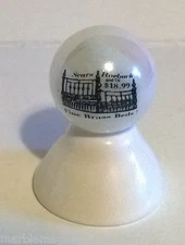 SEARS ROEBUCK LOGO ON WHITE PEARL MARBLE
