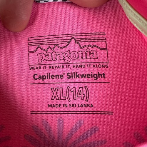 Camiseta Patagonia Capilene Peso Seda Niñas XL 14 Rosa Heal the planet - Imagen 16 de 20