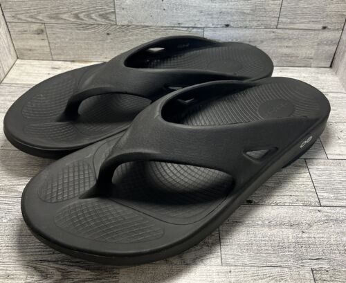 OOFOS schwarze Flip Flop Tanga Sandalen Größe EU 45 US Herren 12 Damen 14
