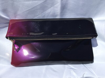 head over heels clutch bag