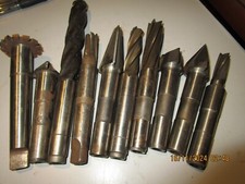 MILLING CUTTERS ASSORTED BROWN & SHARPE TAPER SHANK #7 X 10 , USED OK OLD STOCK