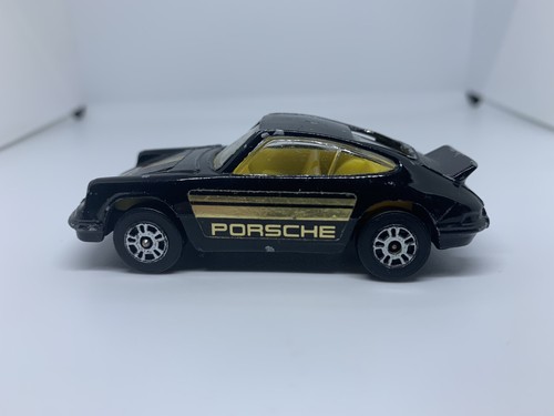 Corgi - Porsche Carrera 911 Negro/Amarillo - Diecast - Escala 1:64 - USADO - Imagen 2 de 3