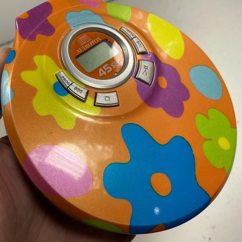Reproductor de CD portátil vintage Audiovox antigolpes DM8703-45 floral funciona naranja - Imagen 10 de 18