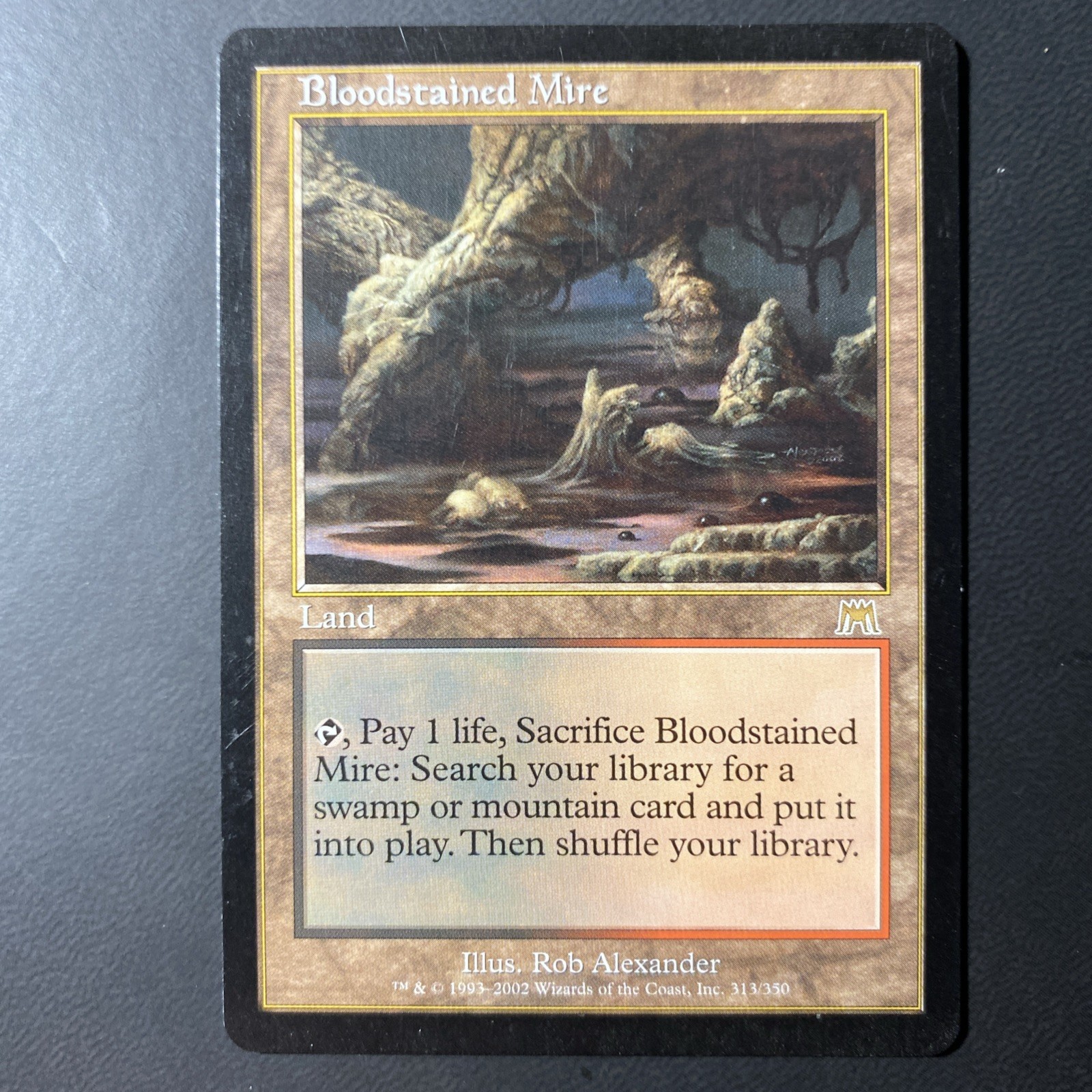1x Bloodstained Mire Onslaught - Very Light Play/LP MTG