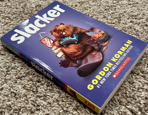 Brand New Slacker - Gordon Korman No 1 NYT Bestselling Author Scholastic - Picture 1 of 3