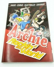 Archie Rockin' the World Paperback  Brand New  First Printing  Copyright 2014
