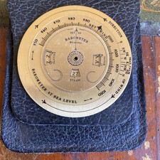 Vintage hand held sea level pocket barometer in fitted leather case