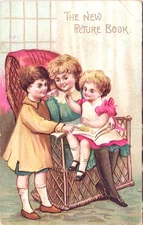 THE NEW PICTURE BOOK c1910 antique postcard embossed germany kids home artist