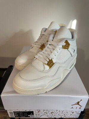 Infrared Accents Appear On An Understated Air Jordan 4 RM