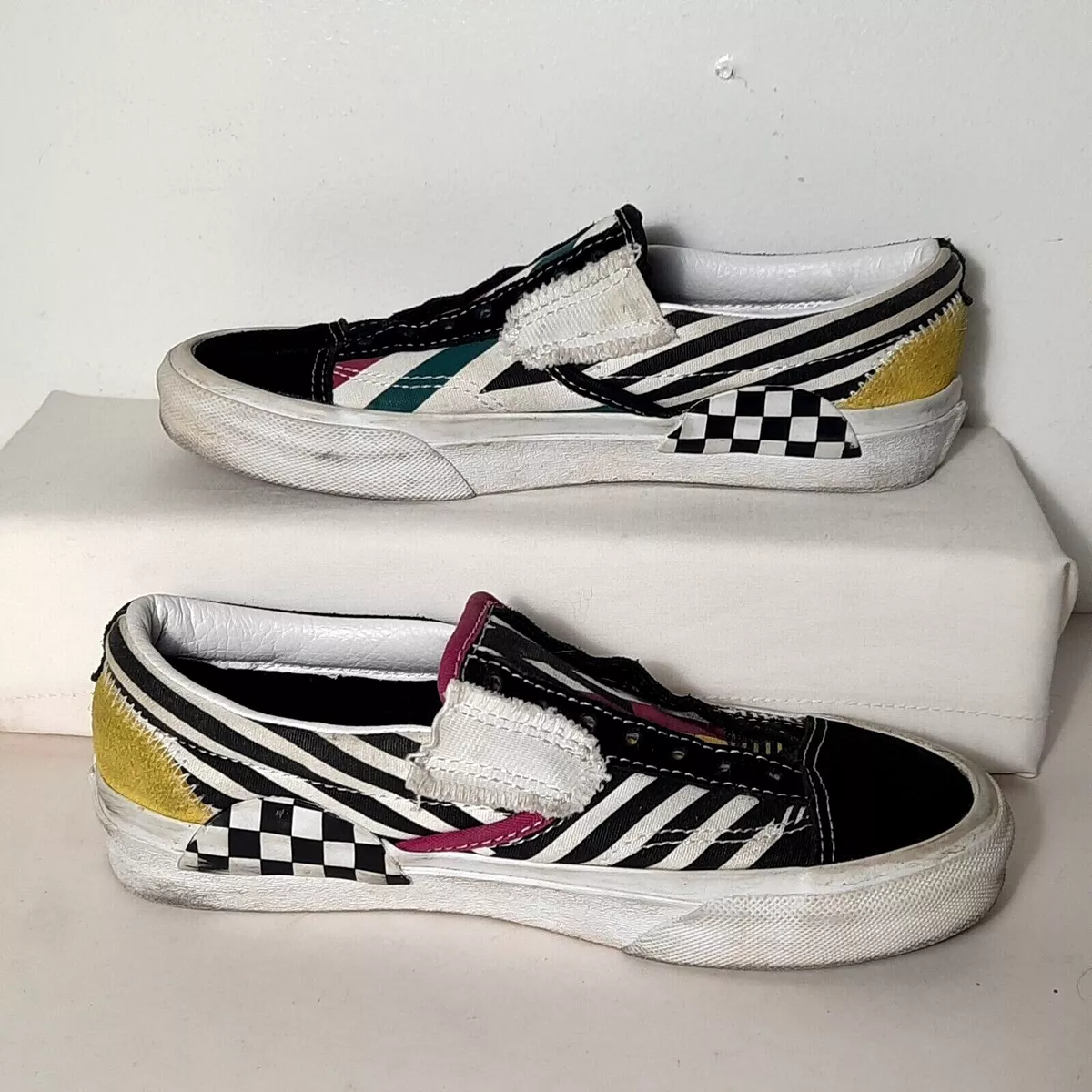 Slip on vans with checkerboard best sale stripe