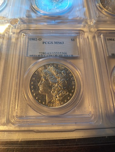 9 morgan silver dollars - all certified pcgs ms63 - in display case with binder - Picture 9 of 17