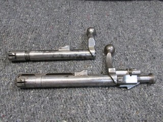 2 USGI RIFLE BOLTS 1 is a REMINGTON 03 AND 03A3 BODY AND OTHER ONE IS COMPLETE