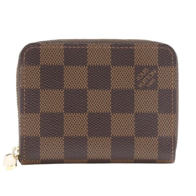 Porte monnaie LOUIS VUITTON zippé autour N63070 marron toile damier unisexe collection