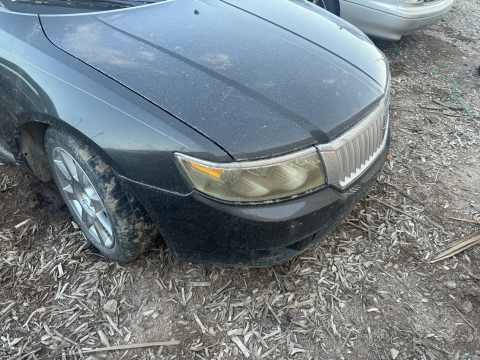 For Lincoln Zephyr 2006 Bumper Cover Front Black  OEM - Image 3 of 3