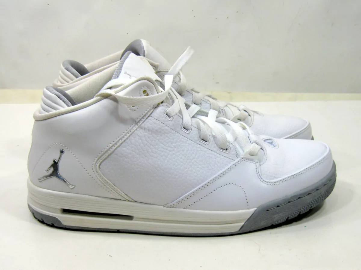 white and silver jordans