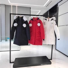 Moose Knuckles men's and women's slim fit mid length down jacket