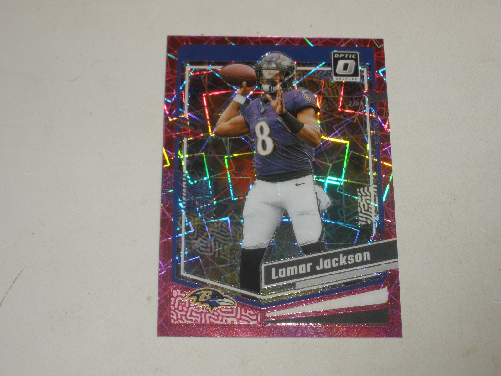 2023 Donruss Optic Pink Velocity Prizm #14 Lamar Jackson 77/79