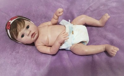 super realistic baby doll