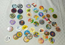 LOTTO 45 DISCHI DISCHETTI VINTAGE POG VARIE SERIE E SOGGETTI GIOCATTOLI