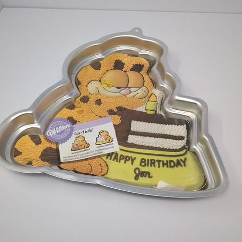 Sartén para pasteles Wilton Garfield de colección con cubierta artística stock # 2105-2447 - Imagen 4 de 12