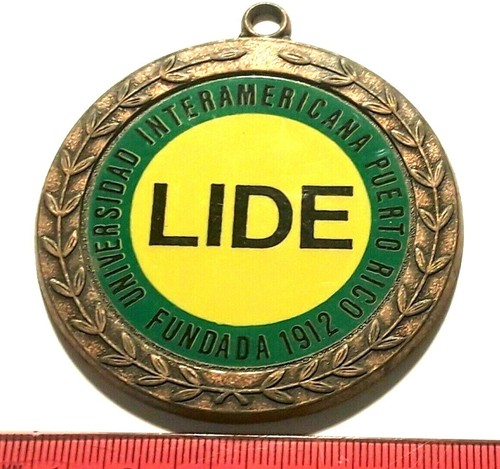 UNIVERSIDAD INTERAMERICANA PUERTO RICO COMPETENCIAS LIDERA ficha medalla - Imagen 2 de 4
