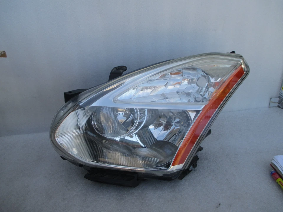 Faro de xenón oculto Nissan Rogue 2009 2010 OEM LADO IZQUIERDO Foto 2 de 4