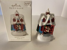 KISSMAS COTTAGE 2010 Hallmark Keepsake Ornament Kringleville Santa 1st in Series