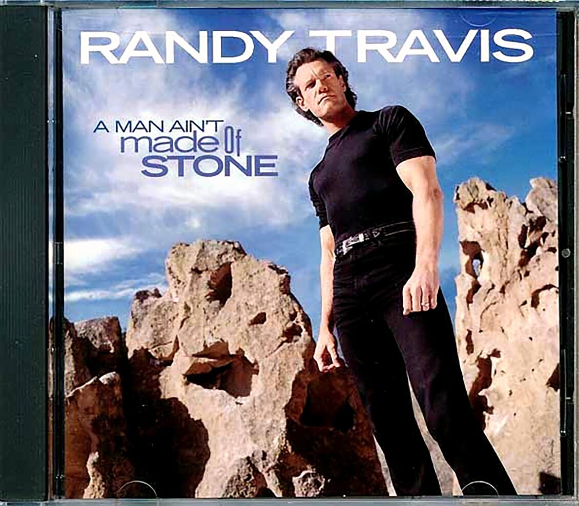 CD Рэнди Трэвис - Человек не Из Камня
