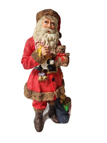 Weihnachtsmann hält Puppe und Bär Sammelfigur in sehr gutem Zustand - 12 Zoll Harz  - Bild 1 von 4