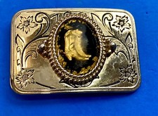 Cowboys boots  spurs w/ gold spec centerpiece on Western ornate belt buckle