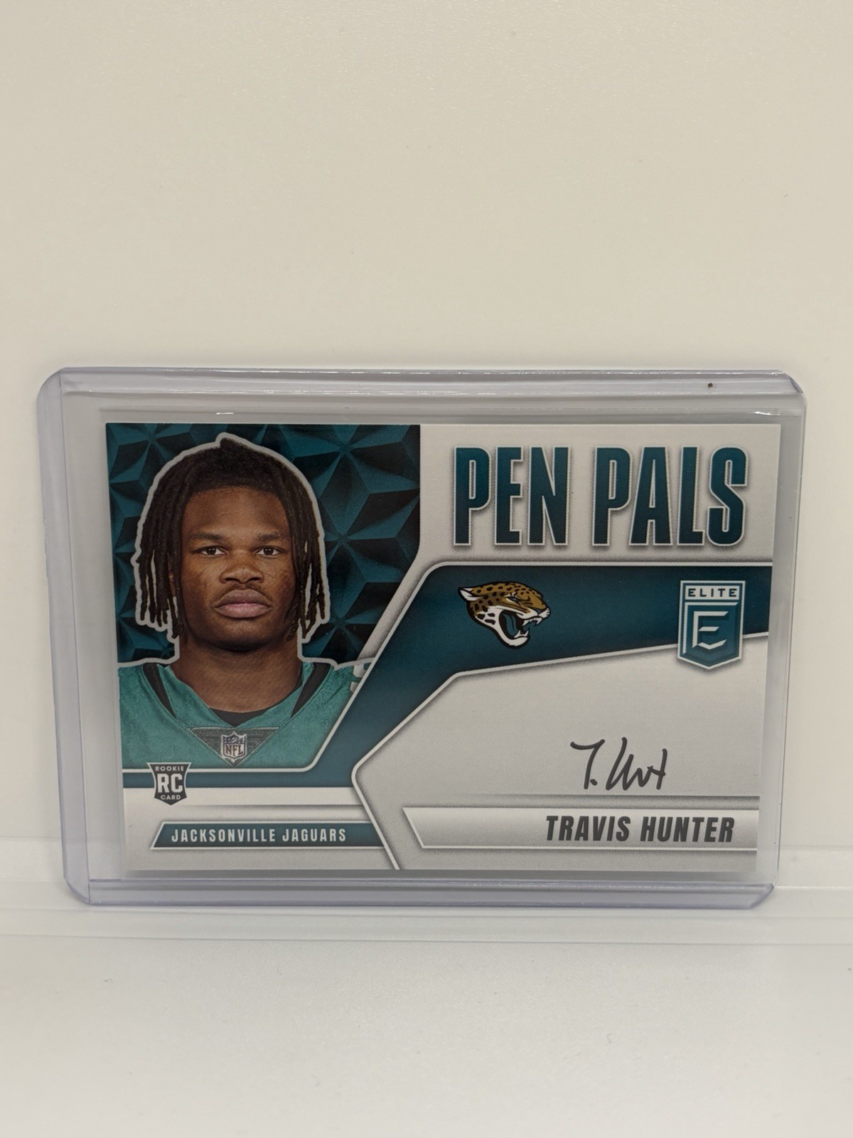2025 Panini Donruss Elite - #PP-THU Travis Hunter Pen Pals Black Ink Auto RC