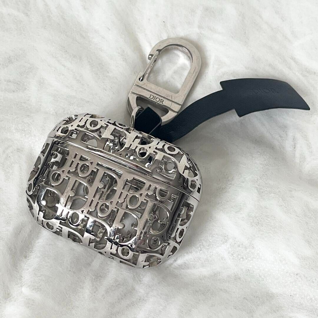 Dior AirPods Pro Case Oblique Silver with storage bag and Dior AirPods Pro Case Oblique Silver with storage bag and