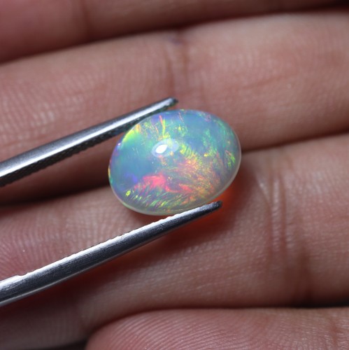 Cabujón ovalado ópalo etíope llamativo AAA natural de 3,8 quilates 13,5 x 10,5 mm - Imagen 5 de 11