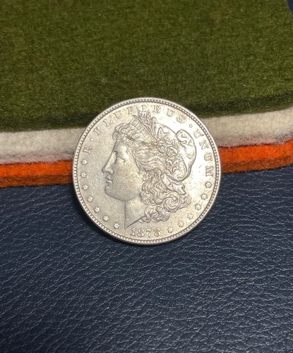 (#101094) Morgan Dollar: 1878.  7 TF rev '78.  AU+       (See video!)