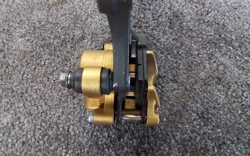 Triumph Street Triple 675 Daytona Gold NISSIN Rear Brake caliper Ex Cond - Picture 2 of 2