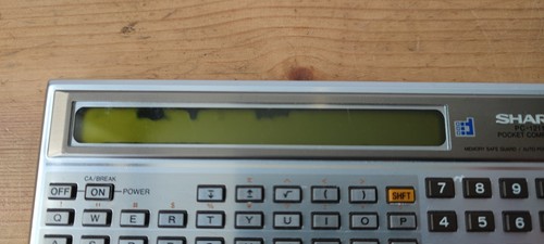 Sharp PC 1211 - New Batteries and Powers on - Good Condition - Dark Patches on S - Picture 8 of 11