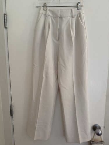 Pantalón blanco pierna ancha hija favorito. Talla 2. "Entrepierna de 30"""