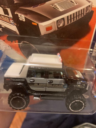 HOT WHEELS HUMMER H2 HW MAIN STREET 2011 DARK BLUE IN COLOR MINT IN BLISTER - Picture 3 of 4