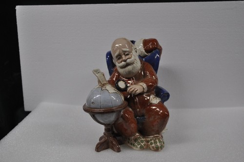 Santa Claus Planning His Trip Around the World - Picture 12 of 14