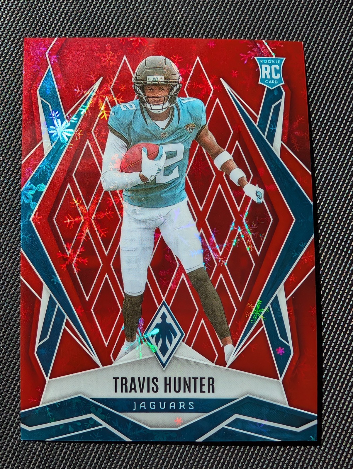 2025 Panini Phoenix - Rookies Travis Hunter #157 Red Winter /399 (RC)