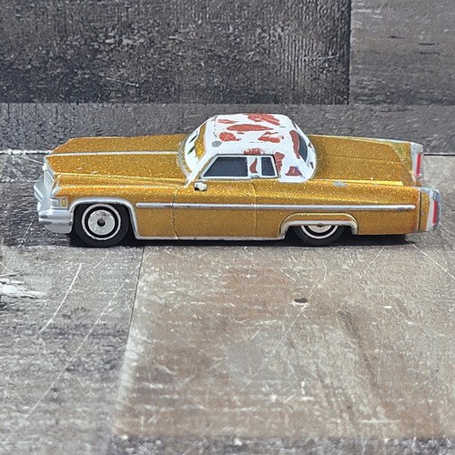 Disney Pixar Cars TEX DINOCO 1975 Cadillac Coupe De Ville Diecast 1:55 - Imagen 6 de 7