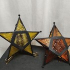 Two Hanging Moroccan Star Voltive Candle Holders One Orange One Greenie Yellow